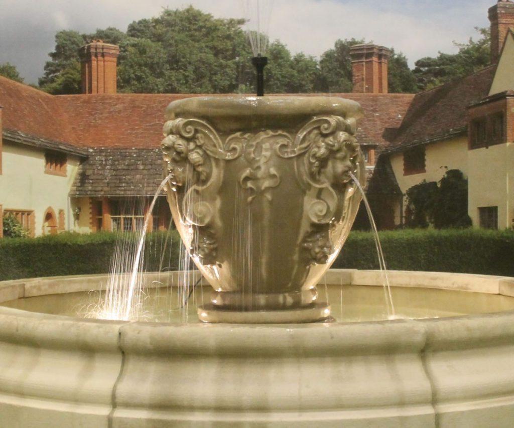 Parisian Cherub Fountain with Medium Romford Pool Surround Stone